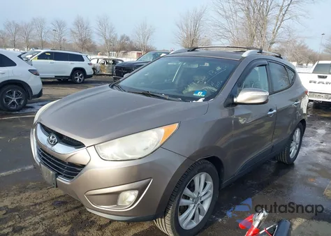 2012 Hyundai Tucson Limited z USA, uszkodzony, nr VIN KM8JUCAC9CU424224